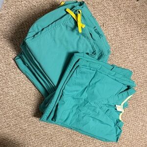 Bundle of green scrubs